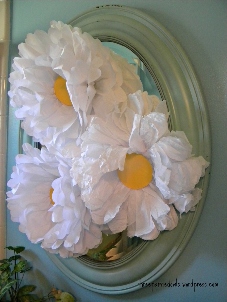 Sorry, I don't have a bride to reflect in the mirror. Wouldn't this be a pretty idea? Ring the mirror with the flowers and take a picture with the reflection of the bride in the center 